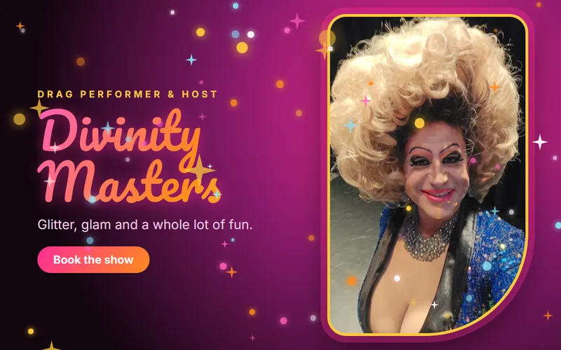 Divinity Masters in a blonde wig and sequined blue jacket, surrounded by glitter and sparkles